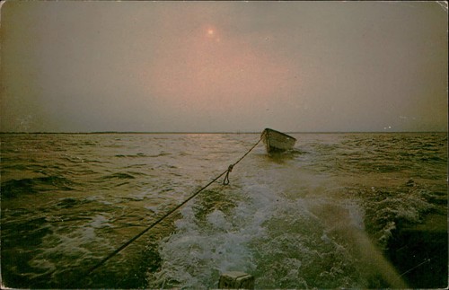 Postcard towing a dory - a,